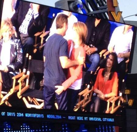 Drake Hogestyn gets goosed by Deidre Hall on stage for fans at Day of Days 2014 (c)Soapdom/LMS